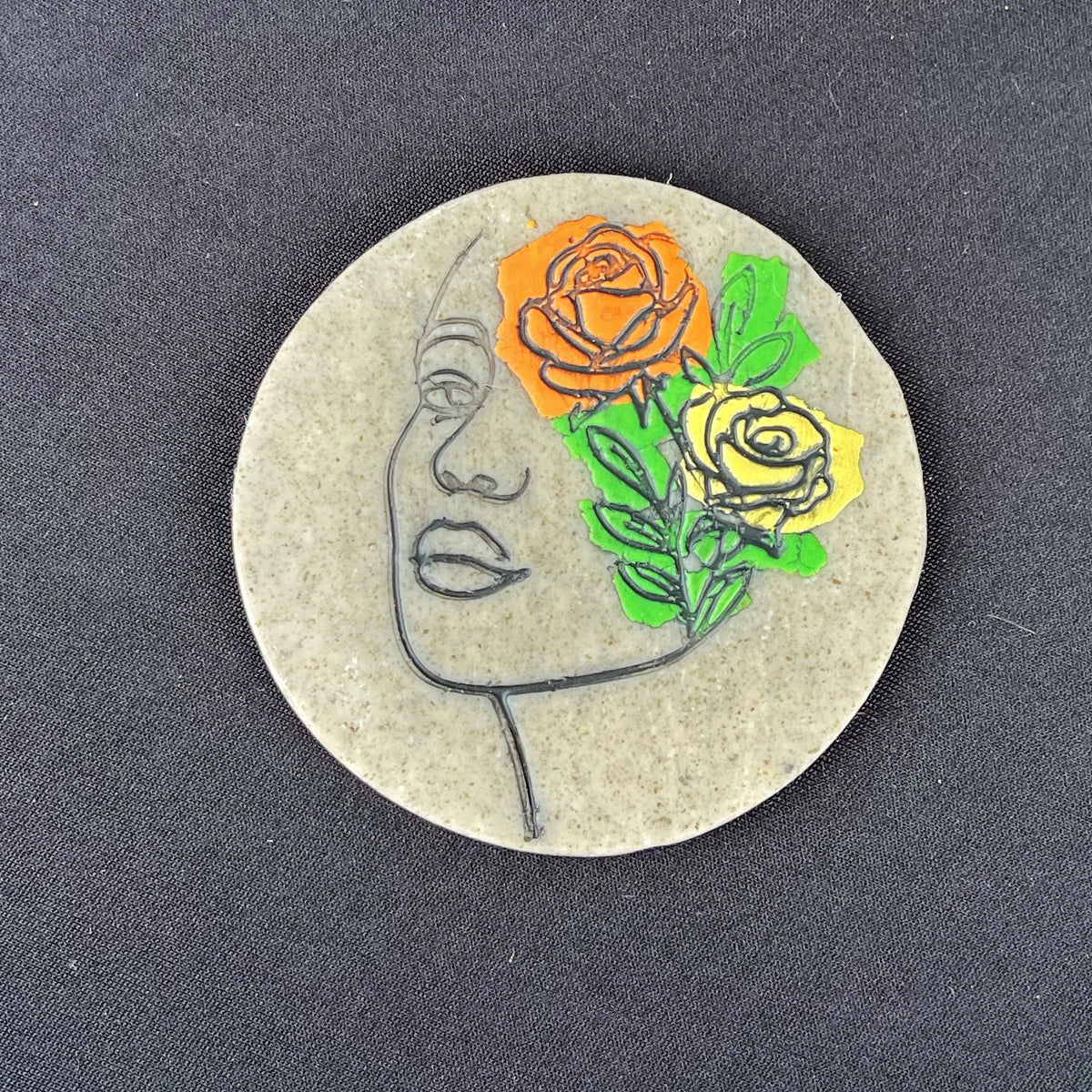 Floral face coaster