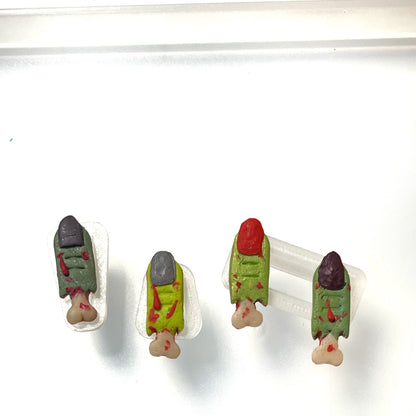 Small zombie finger studs