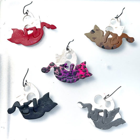 Frolicking Kitties with skulls