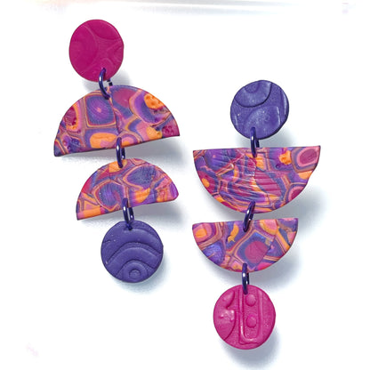 Loud and cacophonous dangles