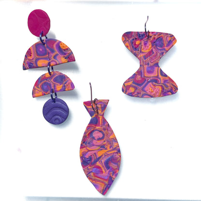 Loud and cacophonous dangles